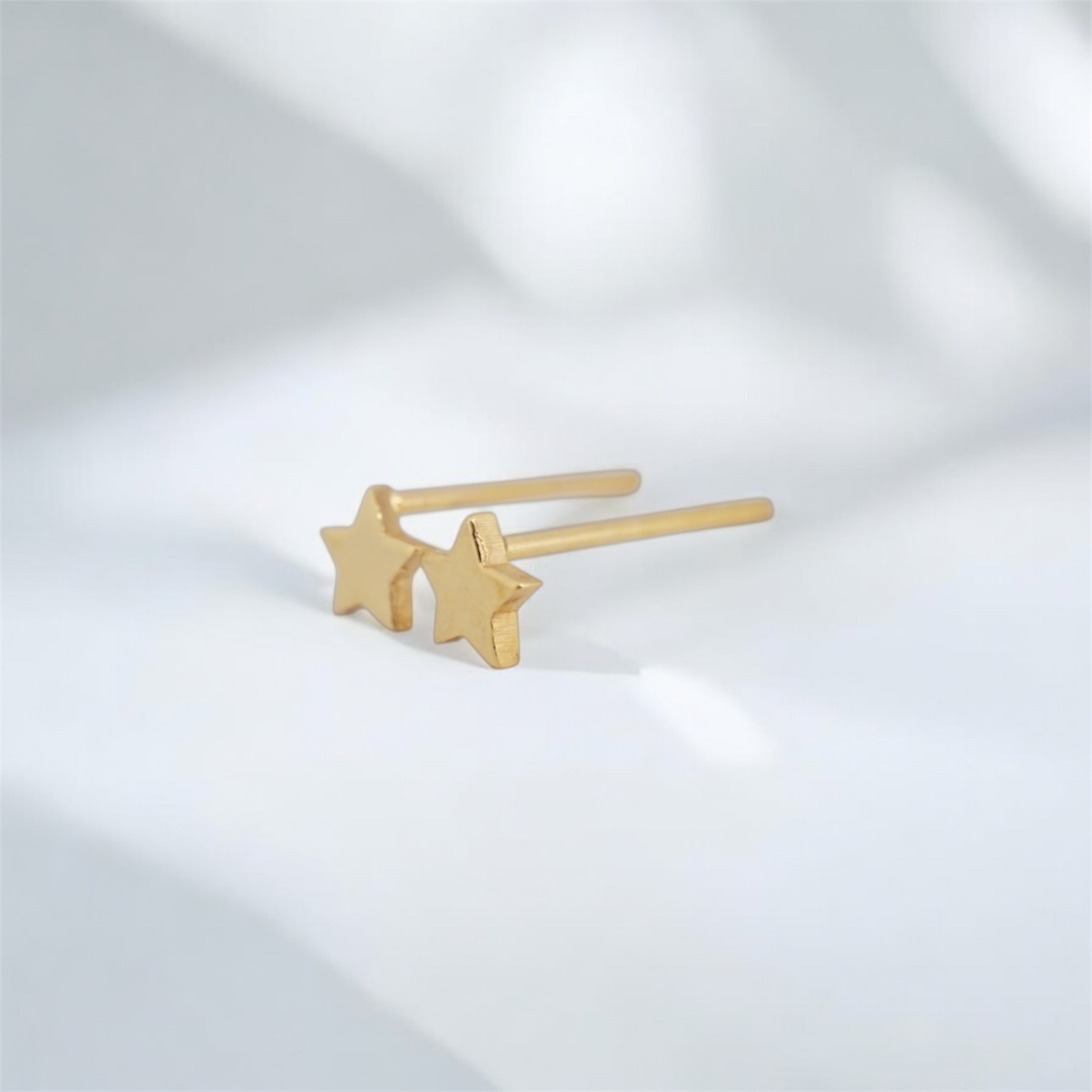 21.6k solid gold star studs: dainty minimalist earrings