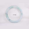 Natural Burmese jade bangle in thin donut shape. Genuine jade bracelet symbolizing protection, harmony, and prosperity. Elegant collectible jewelry gift.