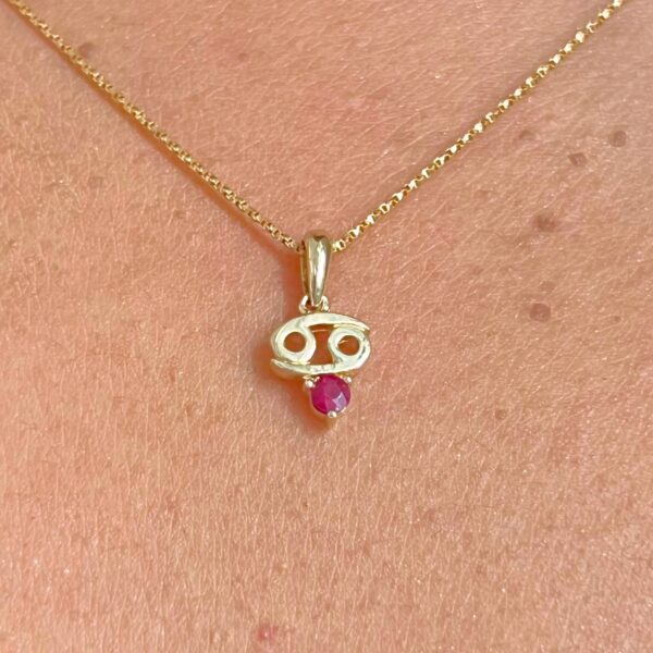 10k solid gold cancer zodiac pendant necklace: au 417 natural ruby charm