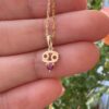 10k solid gold cancer zodiac pendant necklace: natural ruby charm