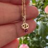 10k solid gold cancer zodiac pendant necklace: natural ruby charm