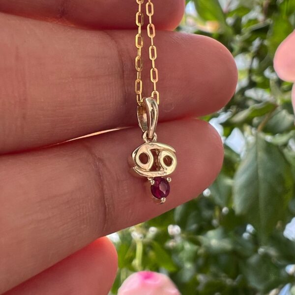 10k solid gold cancer zodiac pendant necklace: natural ruby charm