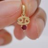 10k solid gold cancer zodiac pendant necklace: au 417 natural ruby charm