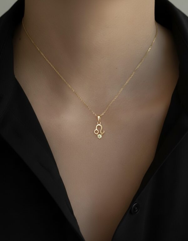 10K solid gold Leo pendant necklace with natural peridot. Genuine Au 417 zodiac jewelry symbolizing strength, confidence, and prosperity. Premium gift ready.