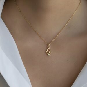 10K solid gold Leo pendant necklace with natural peridot. Genuine Au 417 zodiac jewelry symbolizing strength, confidence, and prosperity. Premium gift ready.