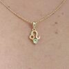 10K solid gold Leo pendant necklace with natural peridot. Genuine Au 417 zodiac jewelry symbolizing strength, confidence, and prosperity. Premium gift ready.