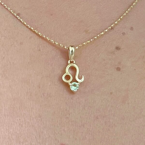 10K solid gold Leo pendant necklace with natural peridot. Genuine Au 417 zodiac jewelry symbolizing strength, confidence, and prosperity. Premium gift ready.